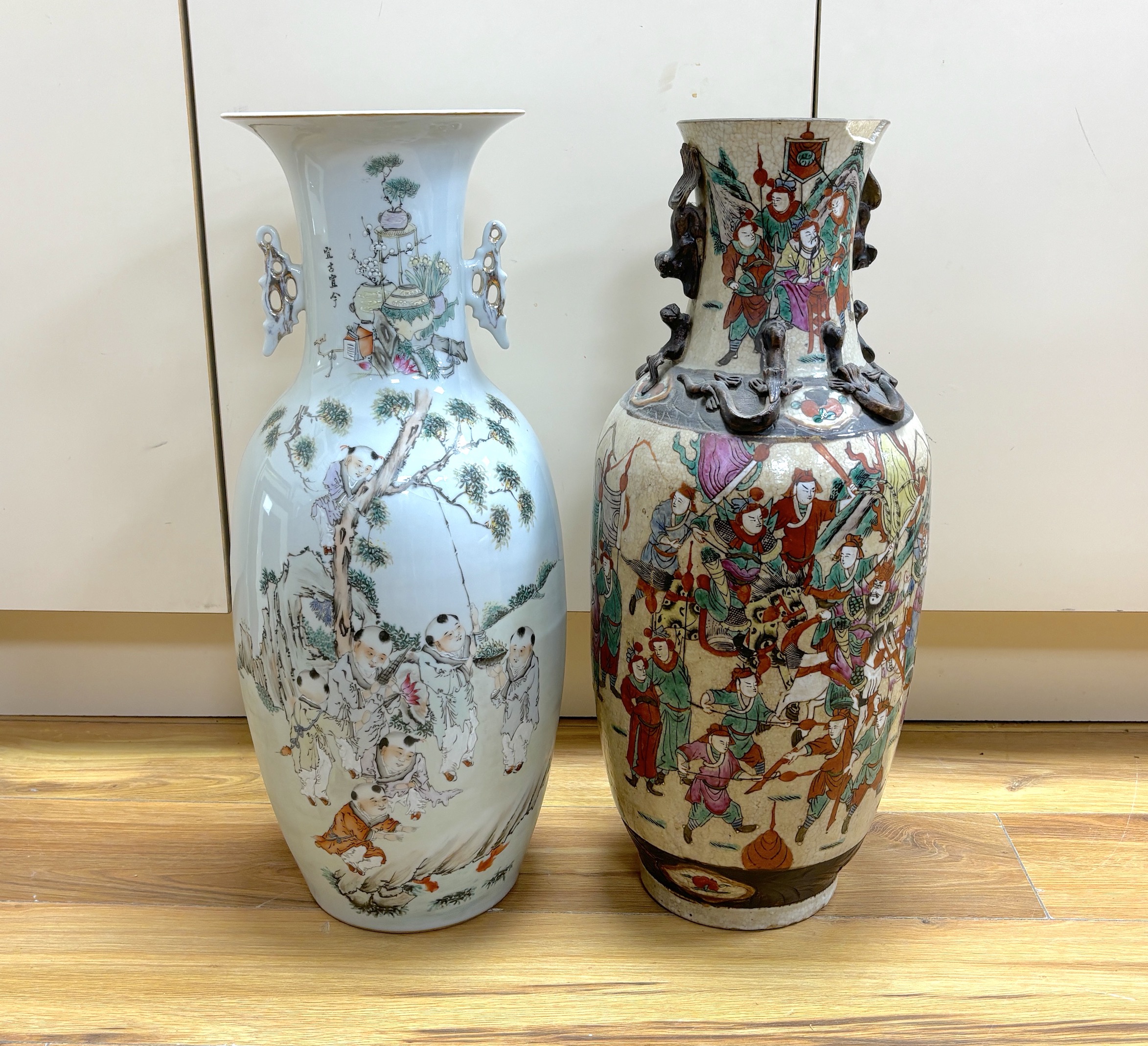 An early 20th century Chinese famille rose crackle glaze vase (damaged) and another, tallest 58cm